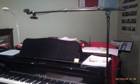 Piano lesson via Skype using overhead webcam suspended from a microphone boom stand